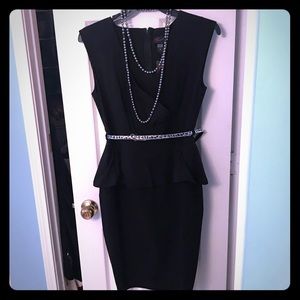 Black pemplum dress